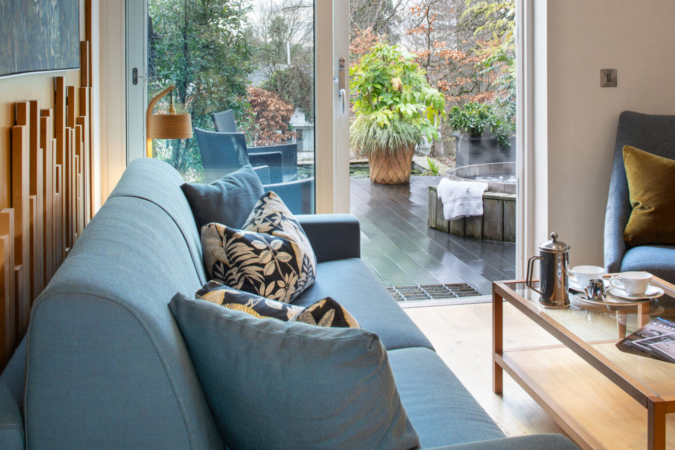 Garden Suite at Gilpin Hotel with a private outdoor hot tub and garden terrace.