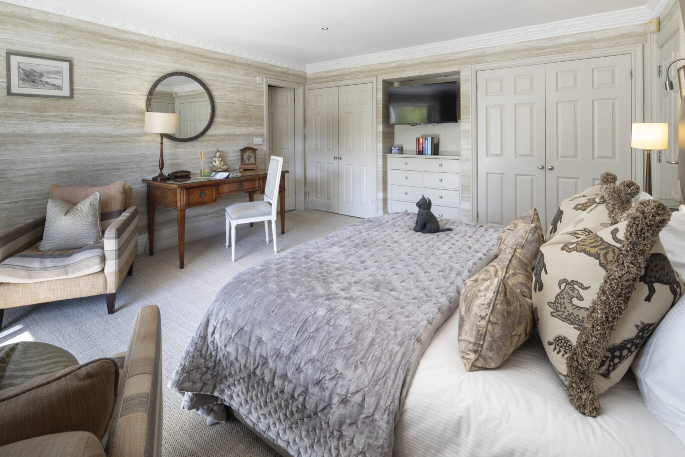 Classic Room at Gilpin Lake House with a king-size bed, comfortable seating, writing desk and soft neutral décor.